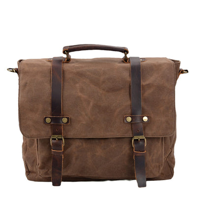 brown canvas and leather messenger bag front