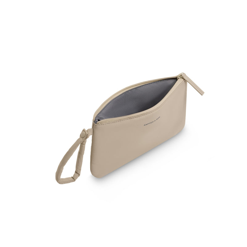 Sandstone pouch unzipped at an angle, showing the grey lining and single main compartment