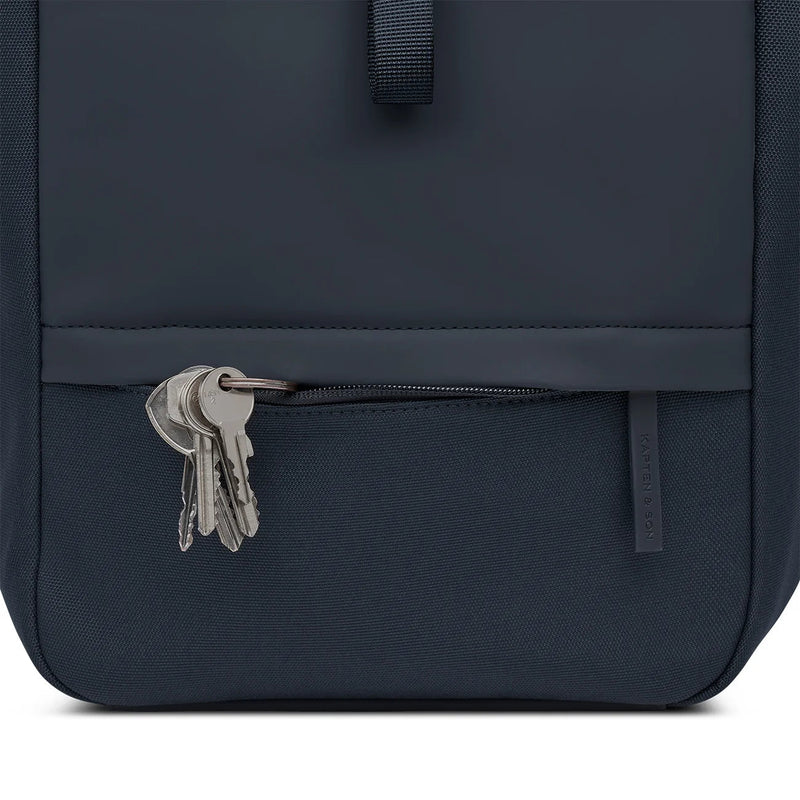Front zipped pocket with integrated key ring clip