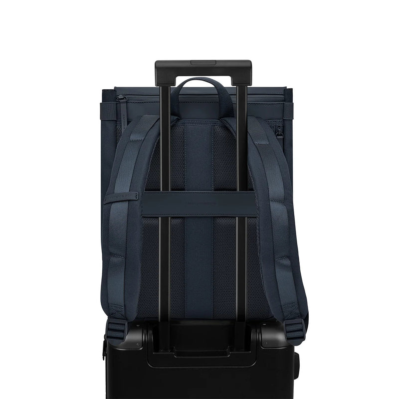 Luggage sleeve fitting over a suitcase trolley handle