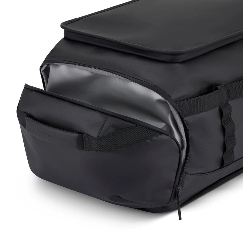 Lined pocket for wet things on the black Lisbon Duffle Backpack Large