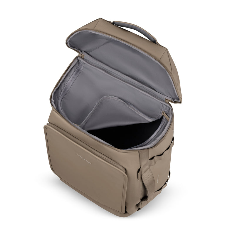 Zipped mesh pockets inside the lid of the walnut Lisbon Duffle Backpack Medium