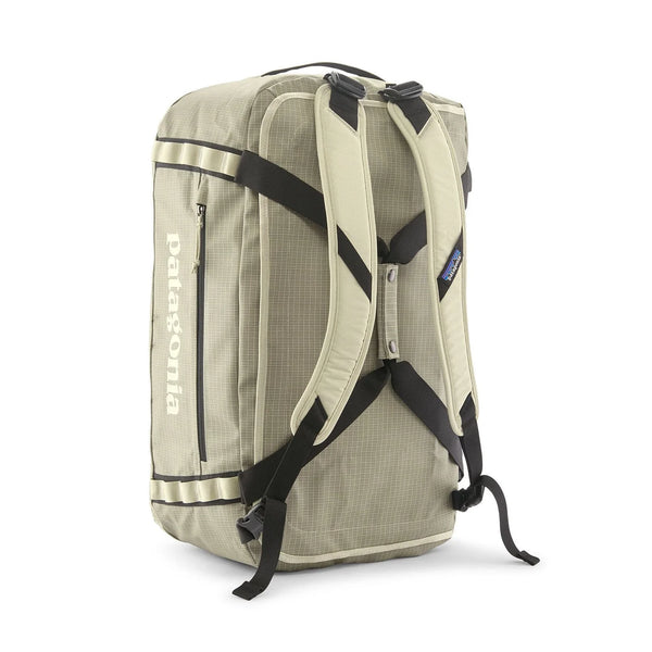 Patagonia Black Hole Duffel 55L Weathered Stone in backpack mode with black straps