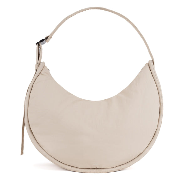 Sandqvist Curve Half Moon Bag in beige — front view of the 21L soft half-moon shoulder bag