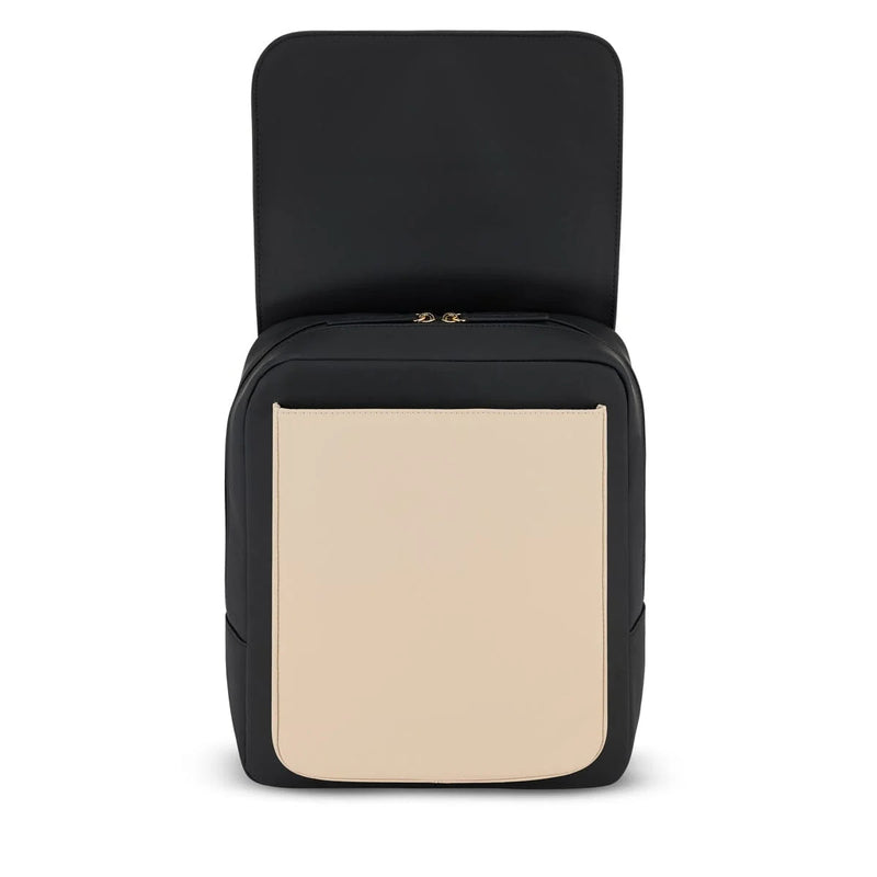 Magnetic flap lifted on the cream black version, revealing the front slip pocket (no zip) and the two gold zip pulls