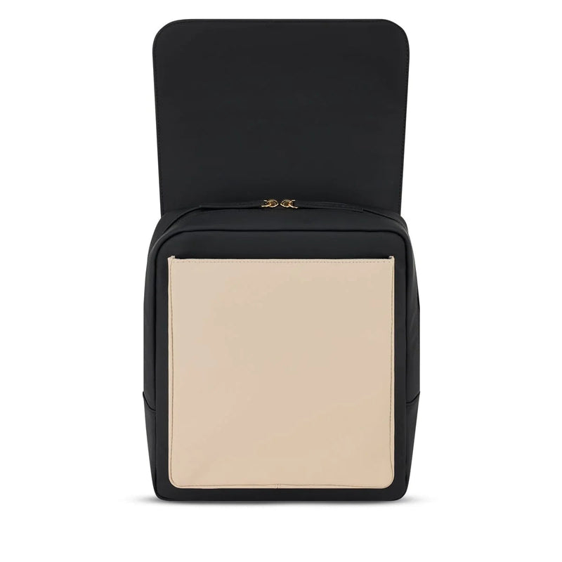 Magnetic flap opened on the cream black colorway revealing the front pocket