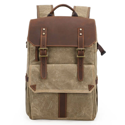 vintage camera backpack with high weather resistance, a dedicated laptop sleeve, expandable side pockets and multiple attachment points