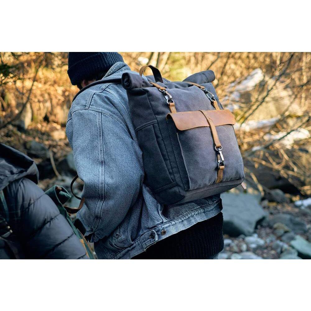 hiker wearing a canvas rucksack 