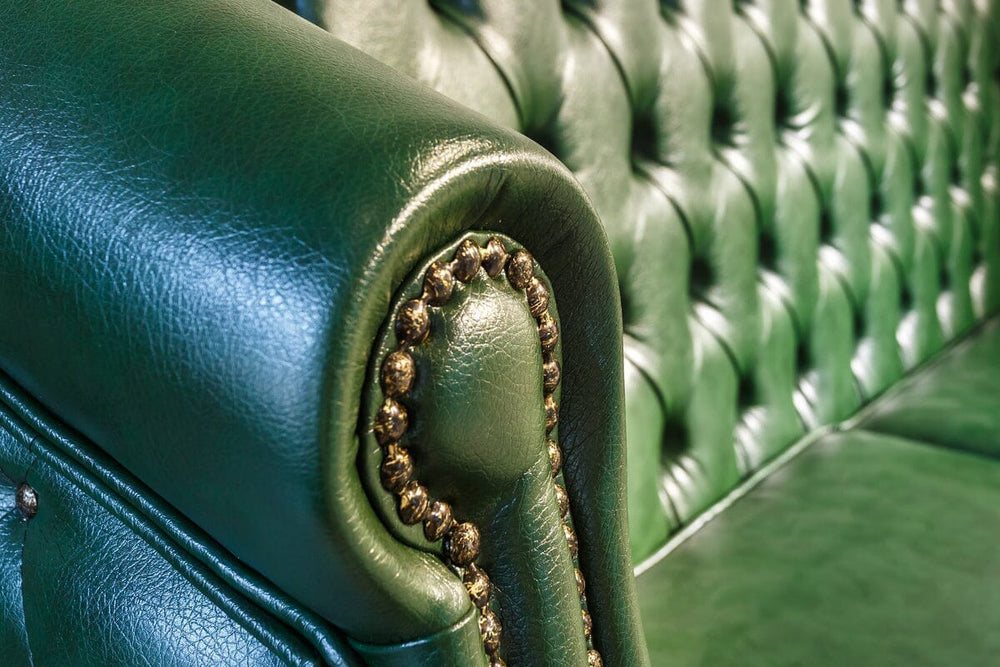 green upholstery leather leather couch