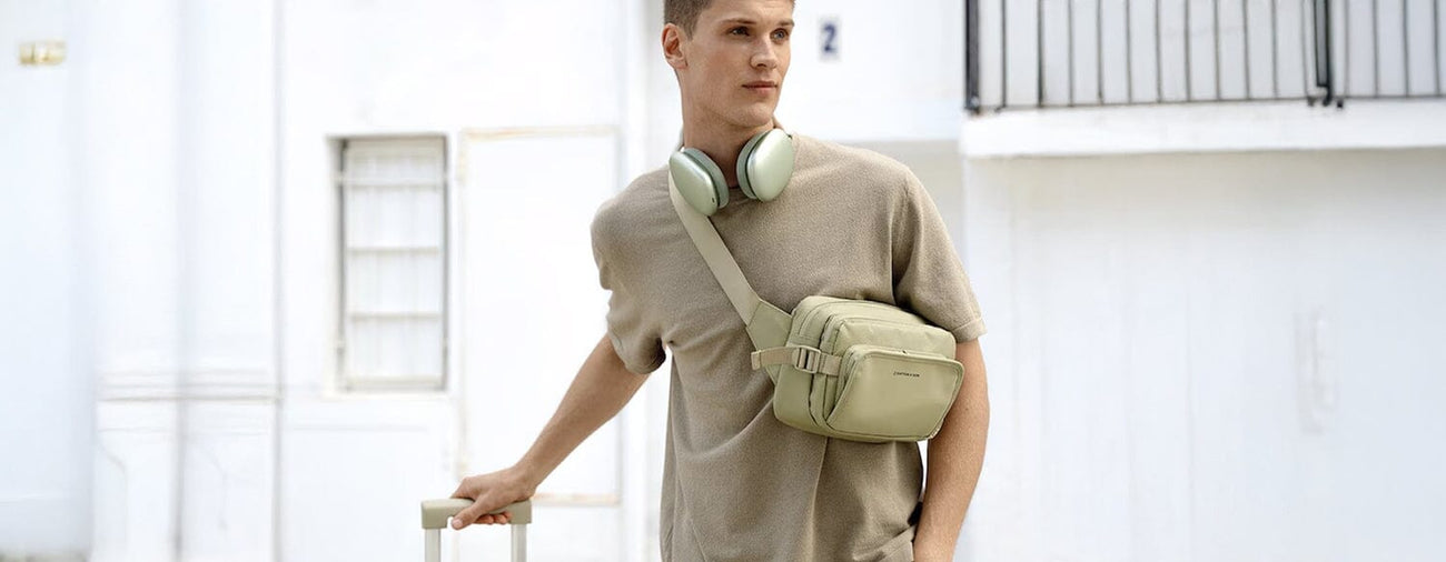 man wearing lisbon crossbody bag in pistachio green