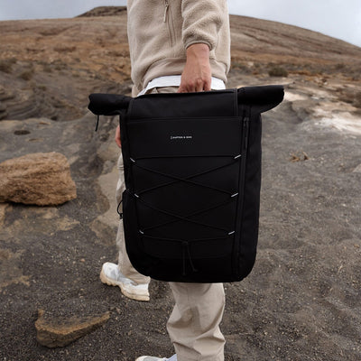 Kapten and son, Banff, lifestyle campaign, man holding a banff all black backpack