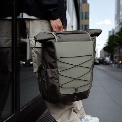 Kapten and son, Banff, lifestyle campaign, man holding a banff forest green backpack