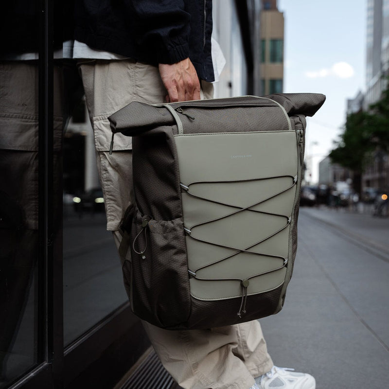 Kapten and son, Banff, lifestyle campaign, man holding a banff forest green backpack