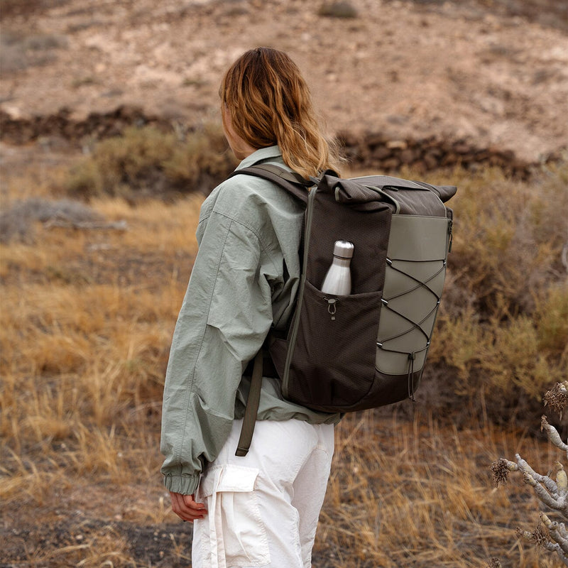 Kapten and son, Banff, lifestyle campaign, woman wearing a banff forest green backpack, back view