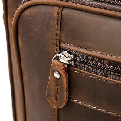 doubled top leather handle of the travel messenger bag