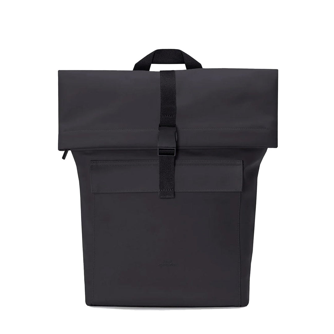 Ucon Acrobatics Jannik Mini backpack in black — front view with rolltop unfolded