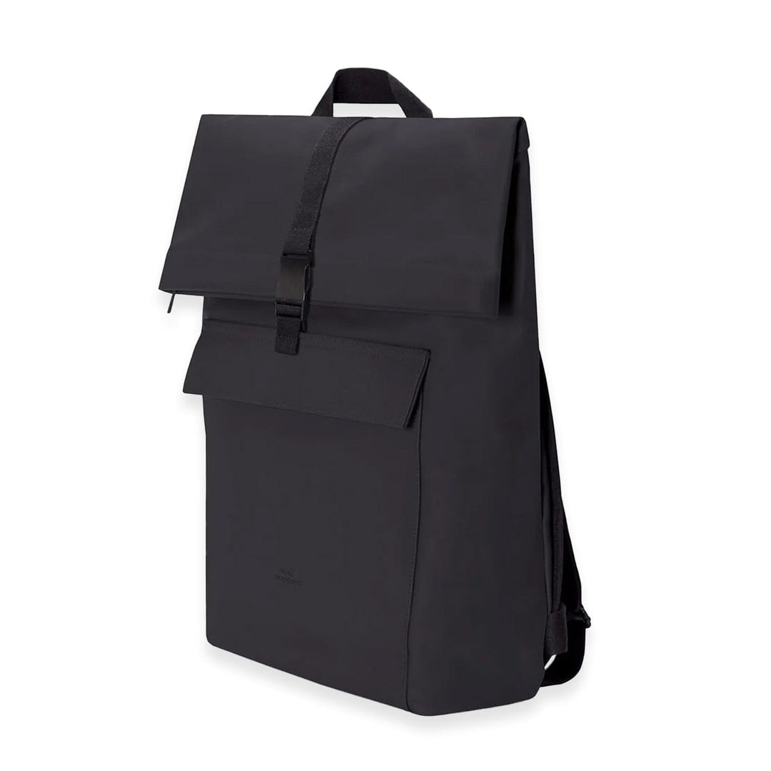 Ucon Acrobatics Jannik Mini backpack in black — side view with rolltop unfolded