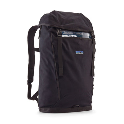 Patagonia Fieldsmith Lid Pack 28L in black, front magnetic clip pocket, buckled cap and daisy chain