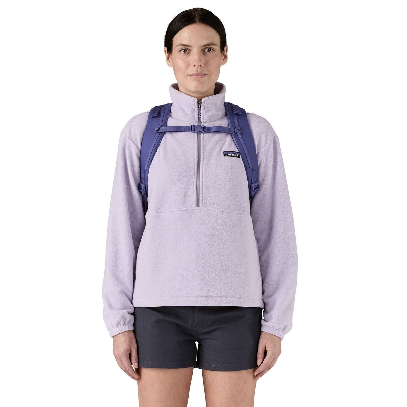 woman model wearing the Refugio Daypack 30L in solstice purple, front view