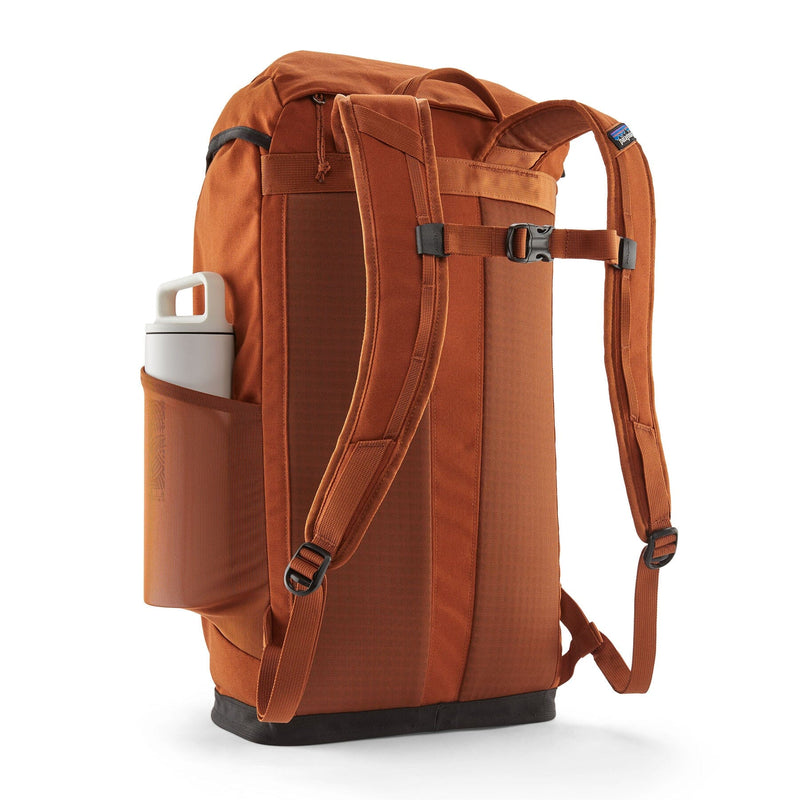 Patagonia Fieldsmith Lid Pack 28L in robin brown, back view, strech mesh water bottle side pocket
