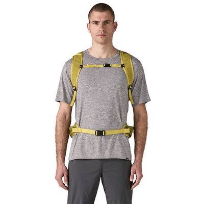 man wearing the terravia pack 28L in graze green, front view
