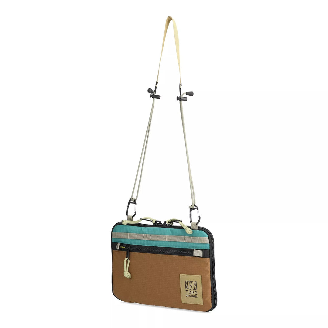 Side profile of the All Adventure Accessory Bag in dark khaki