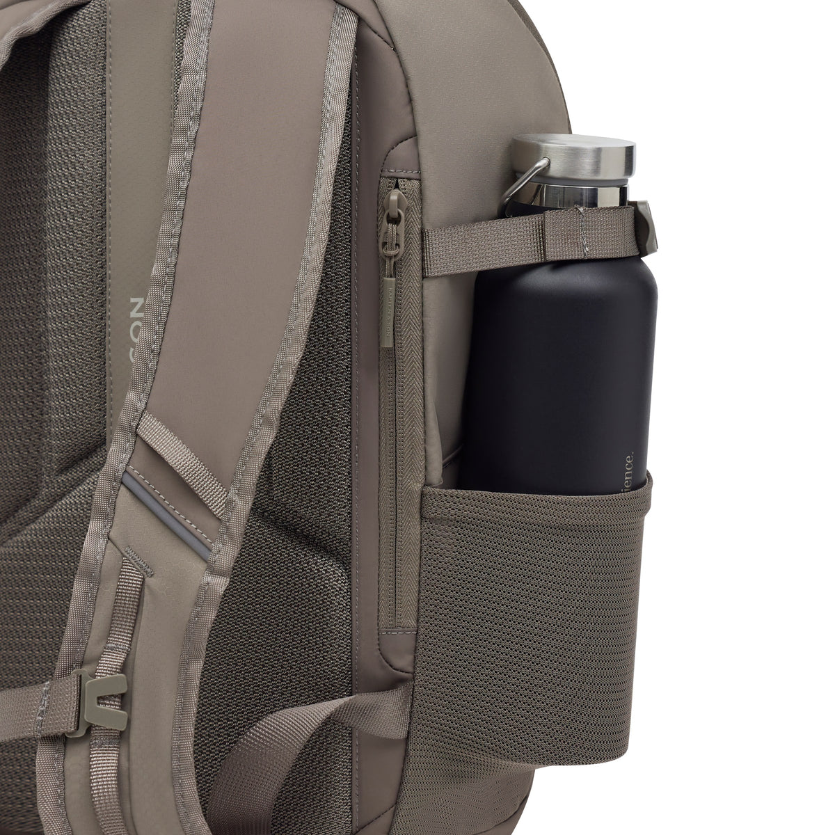 Insulated water bottle carried in the elastic side mesh pocket and strap of the taupe pack