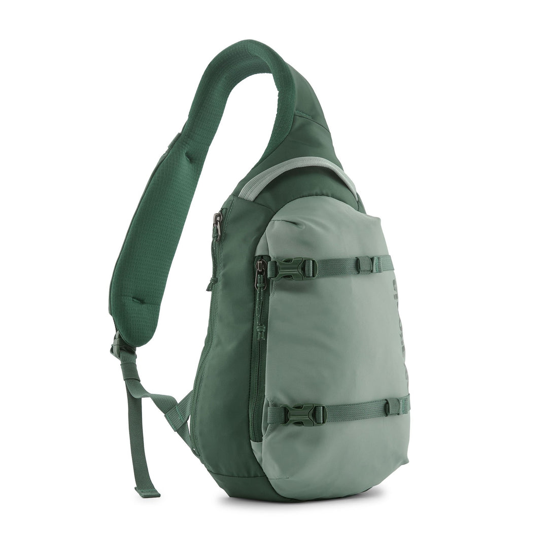 Atom Sling 8L in Cover Green — side profile with padded crossbody strap