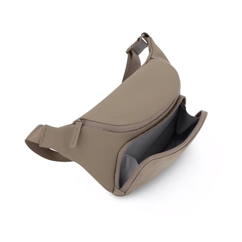 Front pocket open showing quick-access storage on the walnut crossbody