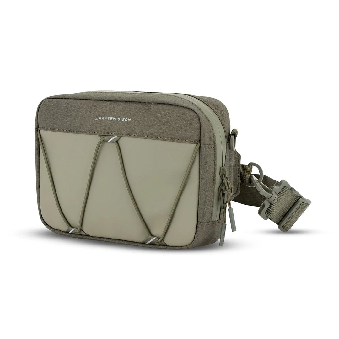 Three-quarter angle of the forest green Banff crossbody with adjustable strap