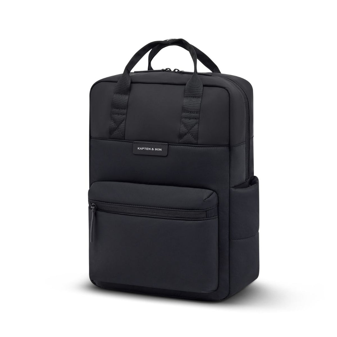 Bergen Cloud backpack in black — side profile showing the padded quilted body