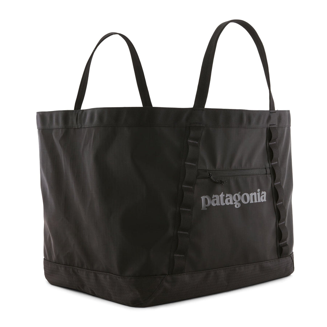 Black gear tote bag with Patagonia logo on a white background
