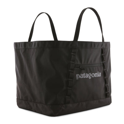 Black gear tote bag with Patagonia logo on a white background