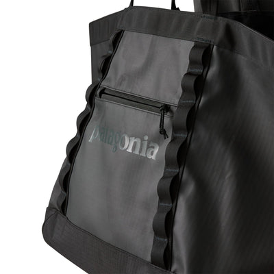 Black Patagonia tote bag with daisy webbing chain and recycled ripstop fabric details