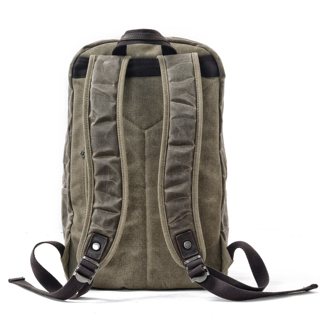 Back panel in army green with contoured padded shoulder straps, webbing adjusters and a hidden zip pocket