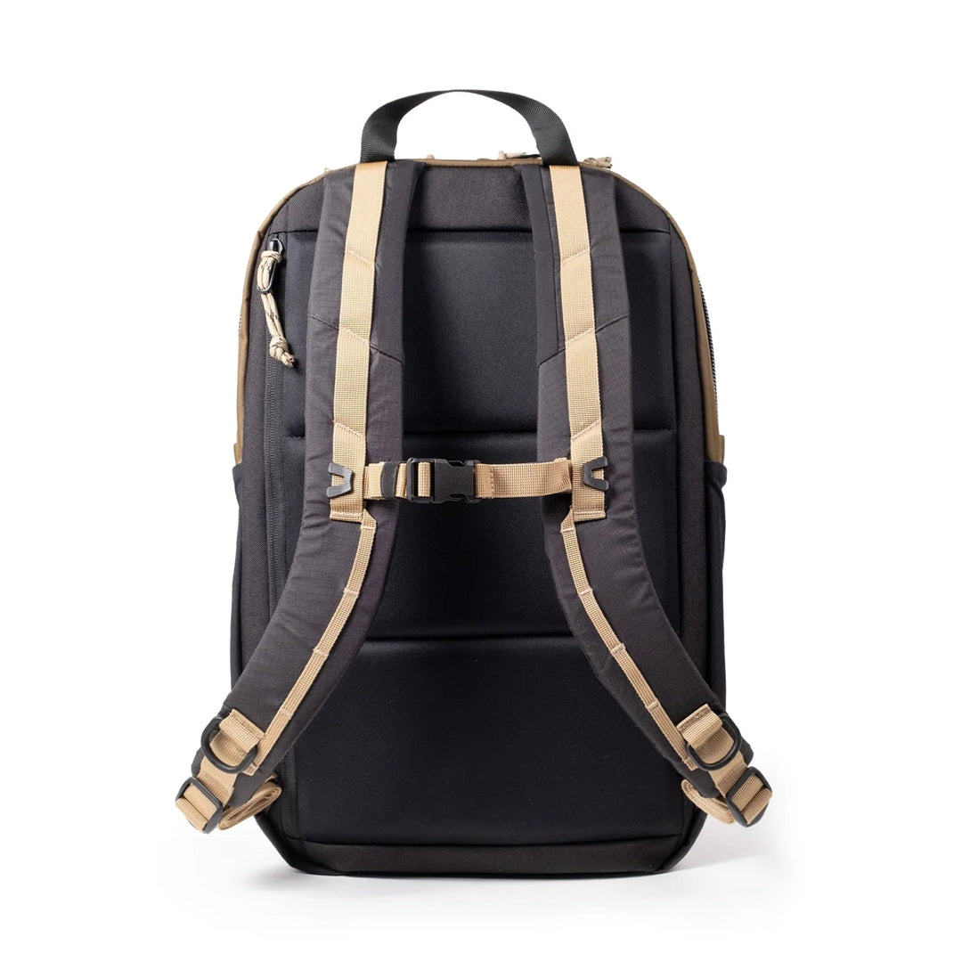 Rear view of the Commuter Backpack in desert palm and elmwood with padded back panel