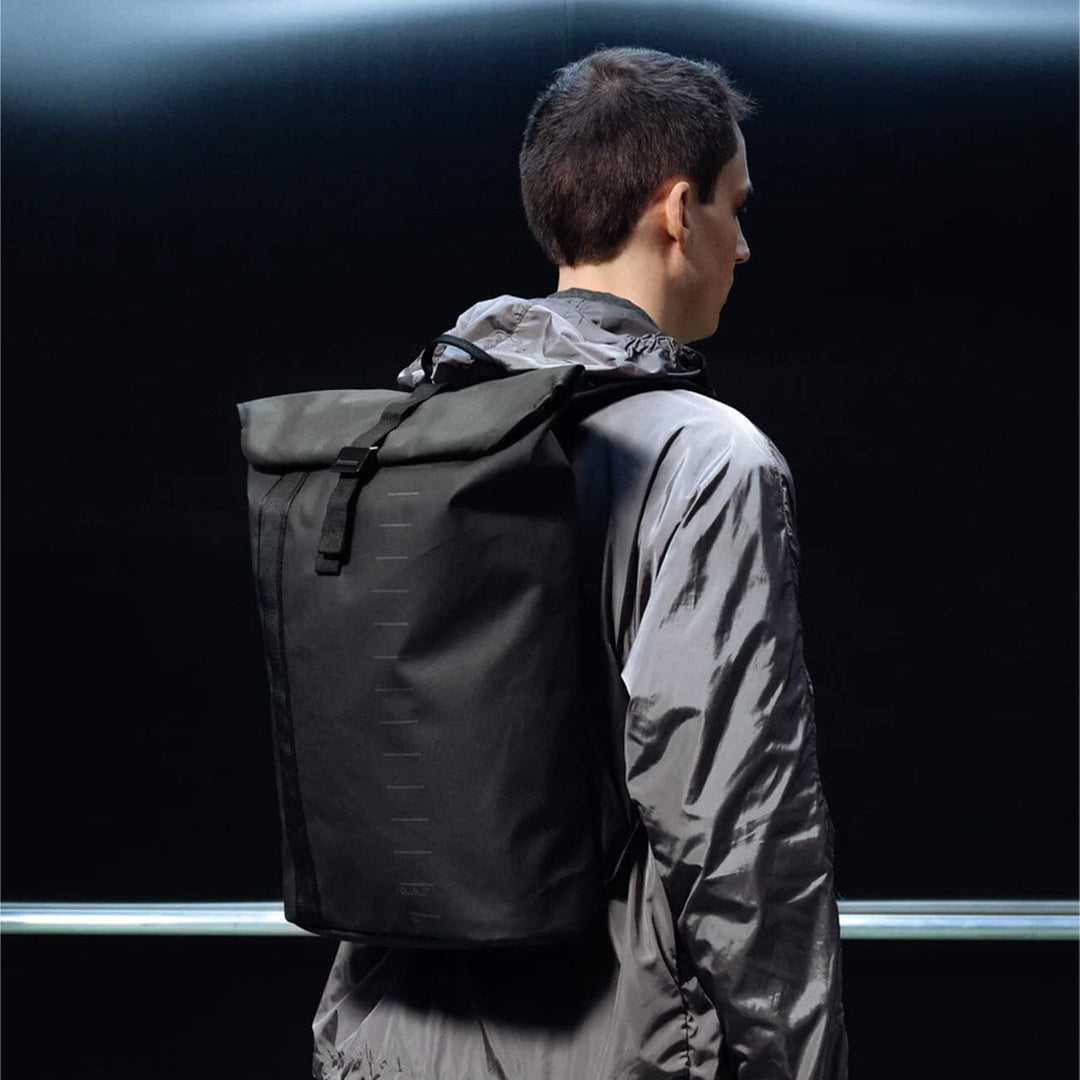 Essential Backpack 24L in black — three-quarter angle