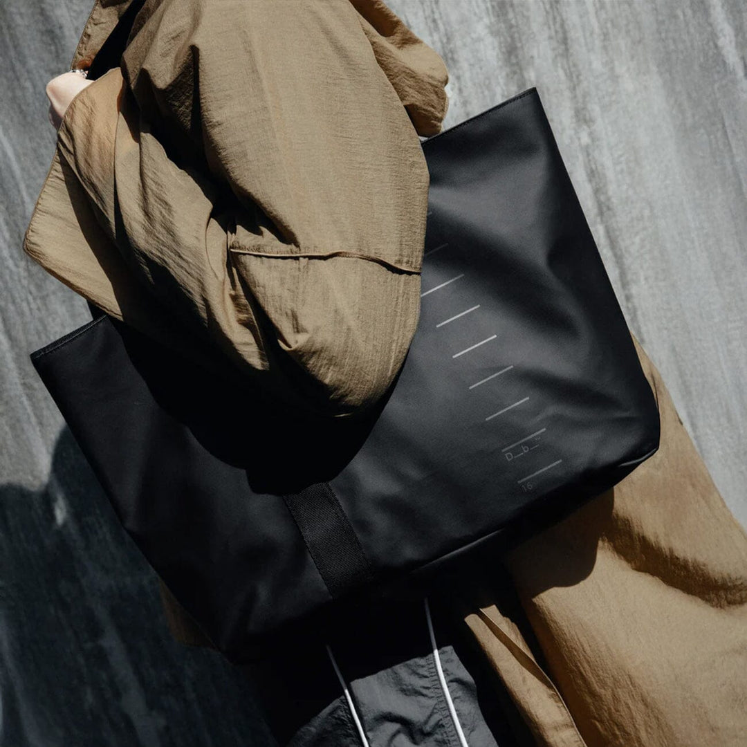 Essential Tote 16L in black — three-quarter angle