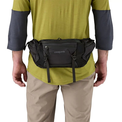 Close-up of a minimalist bike waist pack with external attachment points