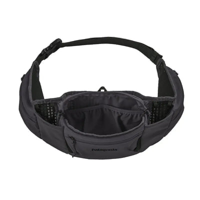 Top view of a hip pack with mesh pockets and organized interior