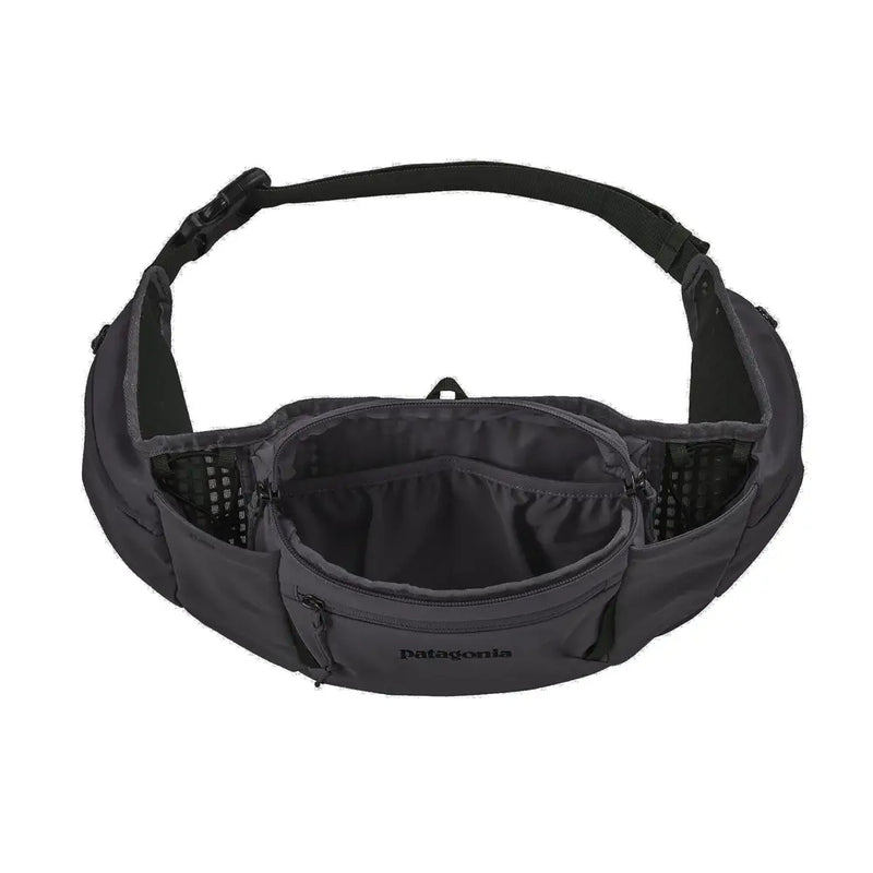 Top view of a hip pack with mesh pockets and organized interior
