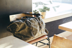 leather and canvas duffel bag