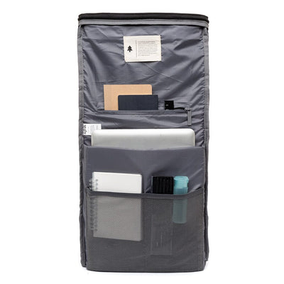 inside view of the padded 15.6" laptop sleeve, two mesh pockets and one zipped pocket