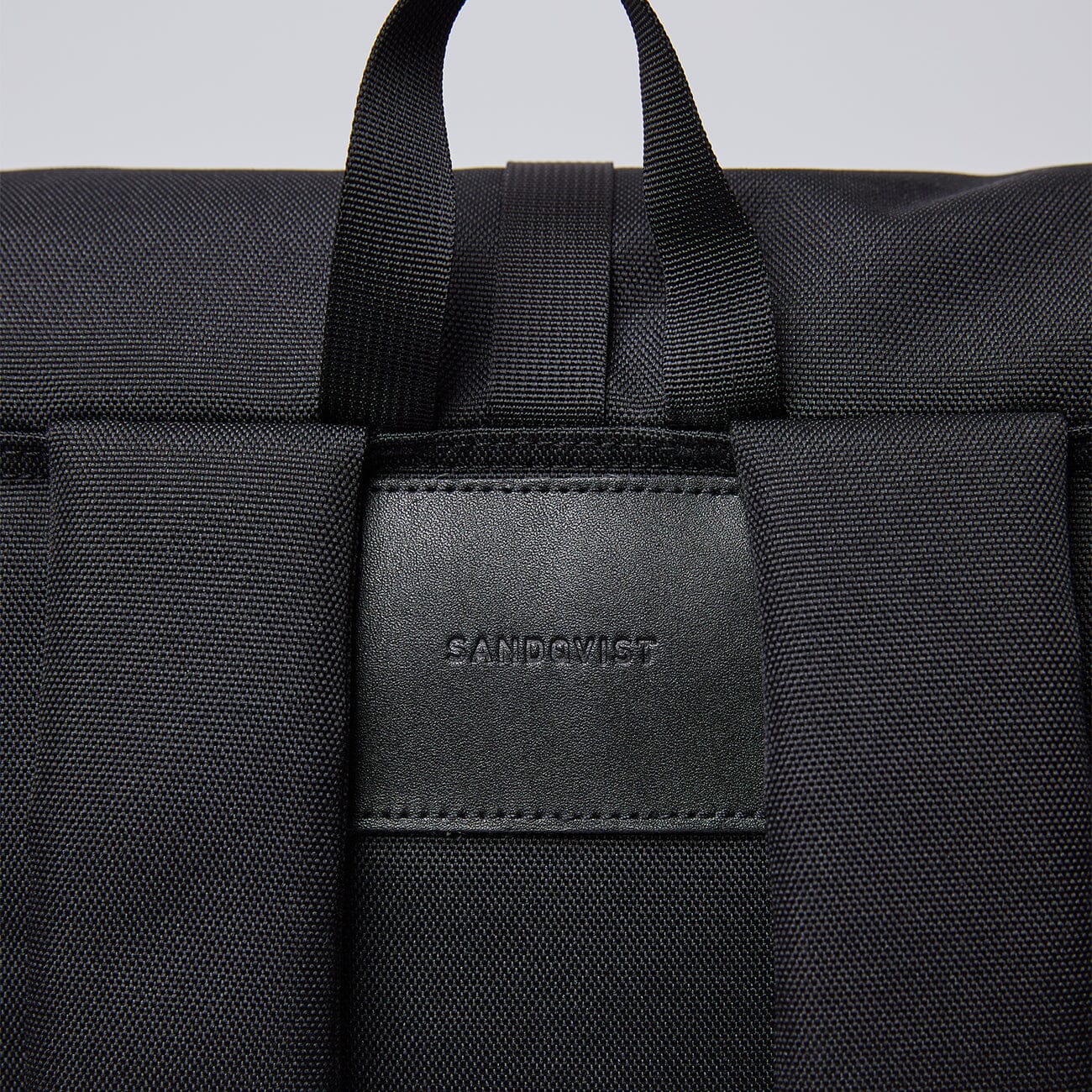eco friendly urban roll top backpack ilon sandqvist black leather accent