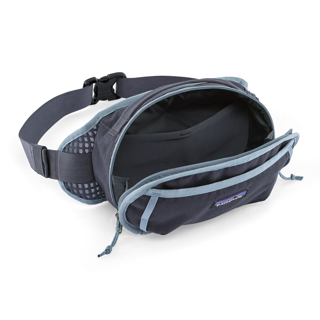 Fieldsmith Hip Pack 5L in Smolder Blue, main compartment open showing internal mesh pocket