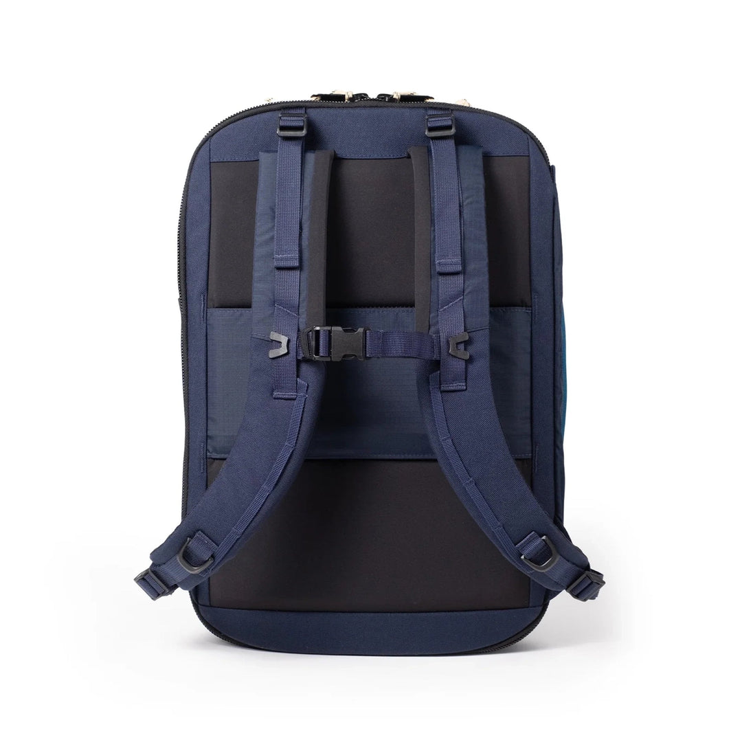 Rear view of the Global Travel Backpack in navy and sahara with hideaway shoulder straps