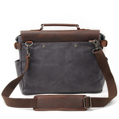 grey canvas and leather crossbody bag