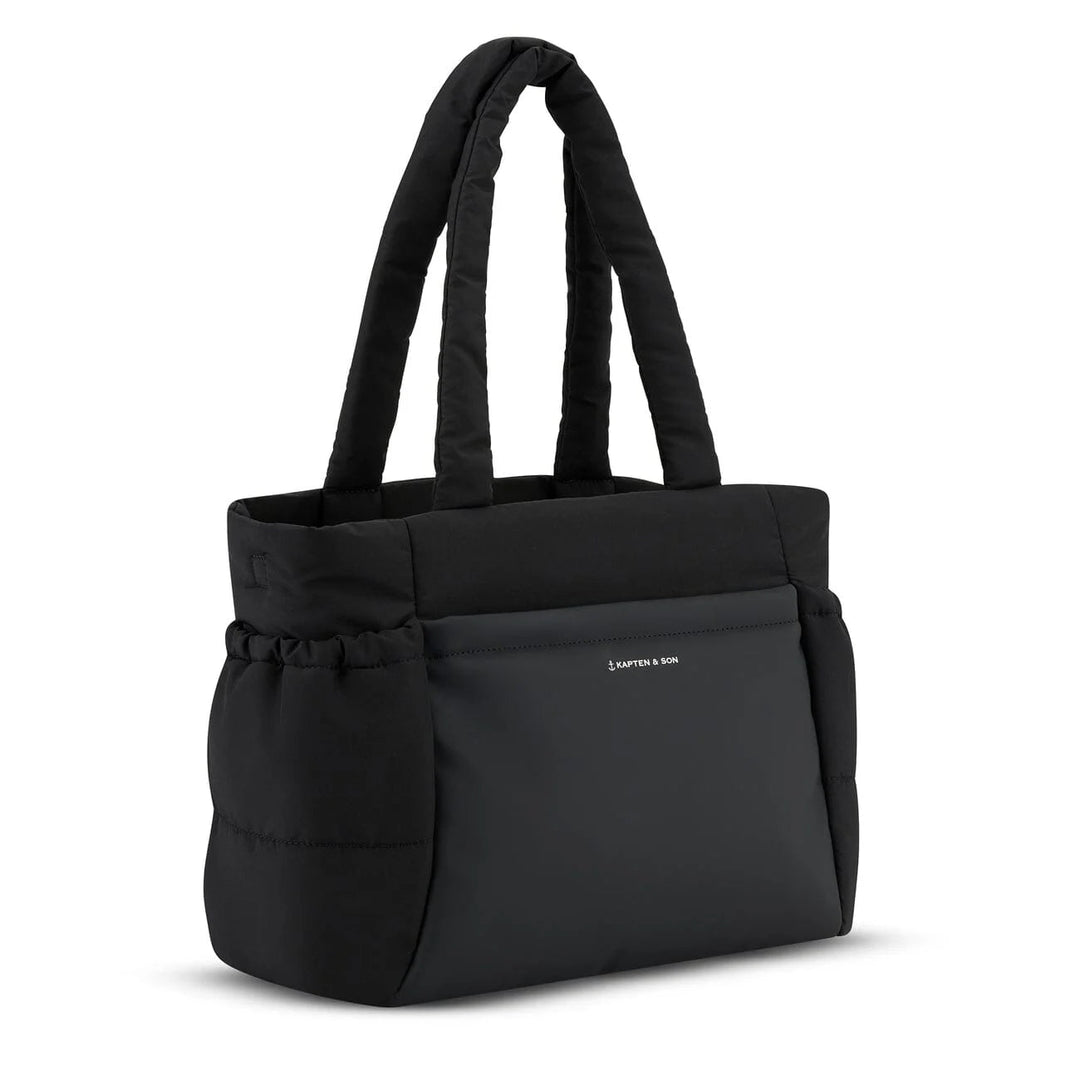 Detachable adjustable crossbody strap — wear it as shoulder or crossbody bag
