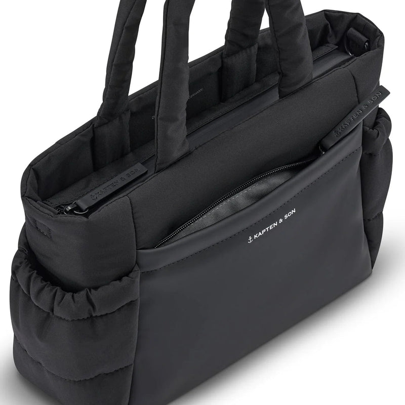 Front zip pocket open, with branded zip pull