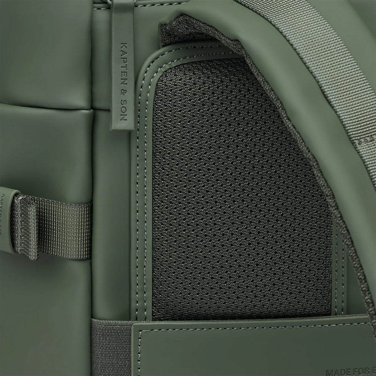 Padded mesh back panel of the dusty green Helsinki
